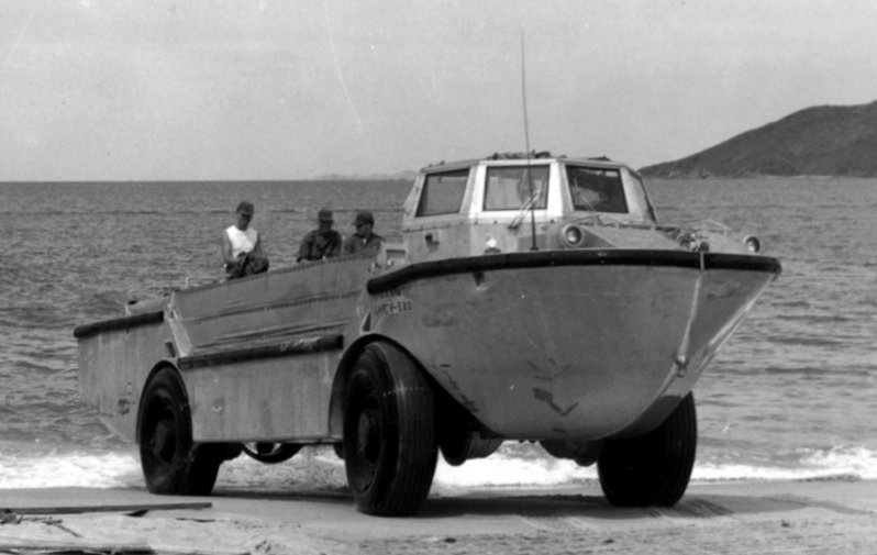 LARC5 amphibious vehicles on surf beach